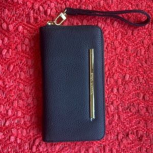 Black Steve Madden clutch/wallet. New,never used.
